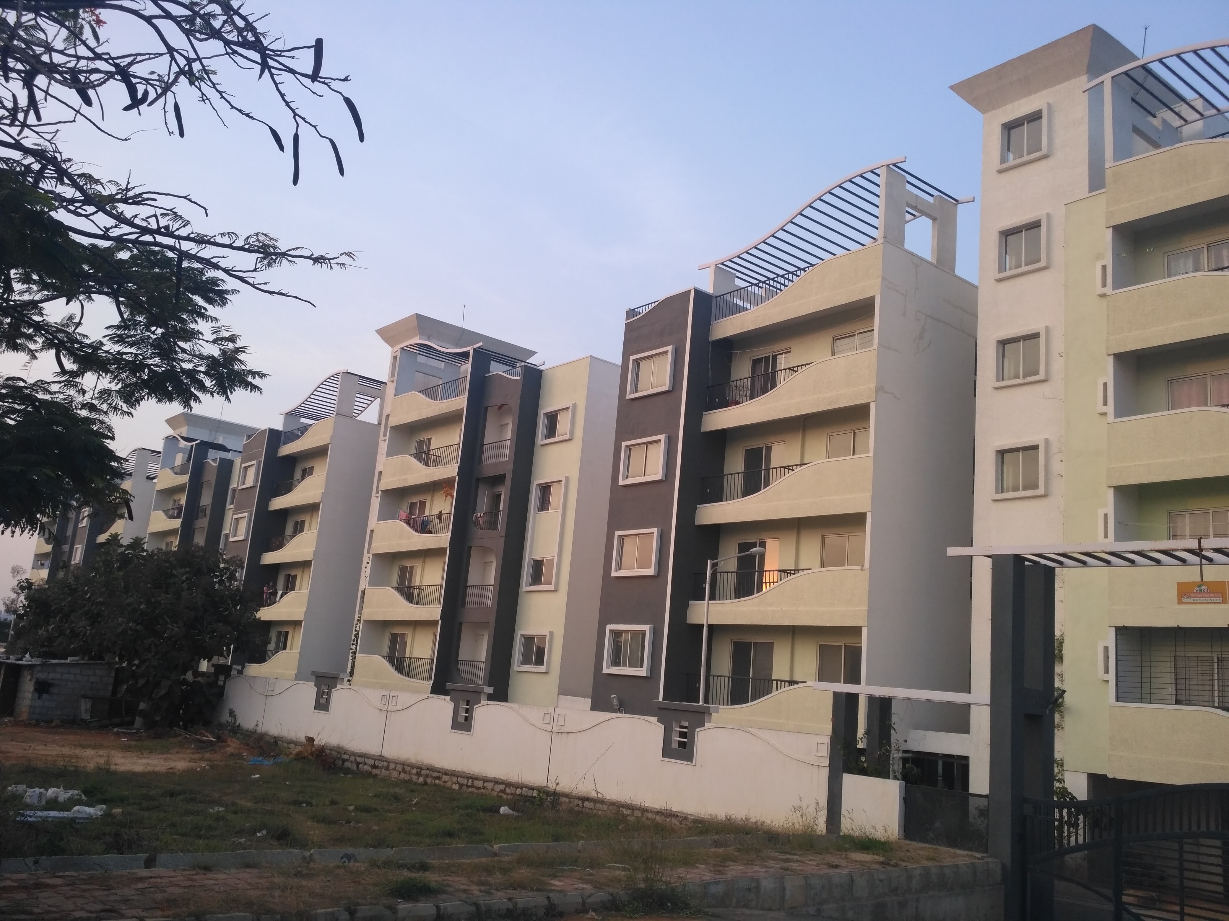 Vakil Housing Development Corporation Vakil Whispering Woods Photos And Videos Bommasandra